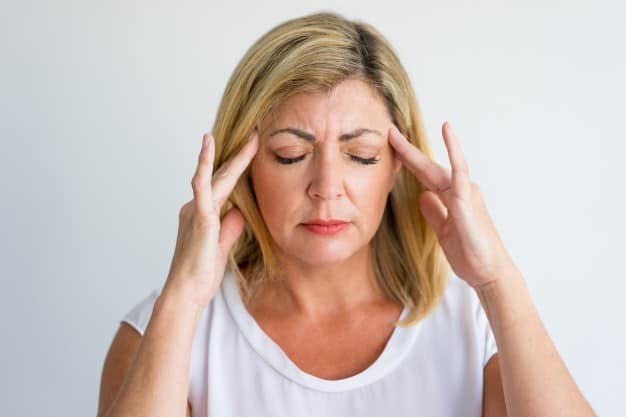 annoyed-woman-feeling-pain-touching-temples-while-trying-to-concentrate_1262-11390.jpg